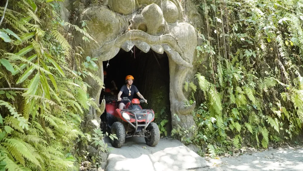ATV entering a cave-like route feature