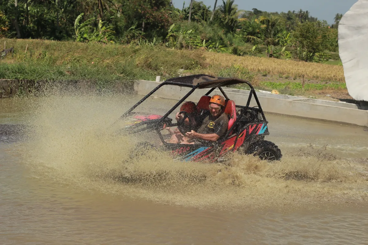Buggy crossing a muddy water section